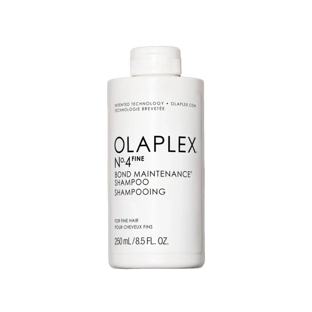 Witte fles Olaplex No.4 Fine Bond Maintenance Shampoo van 250 ml tegen een zwarte achtergrond.