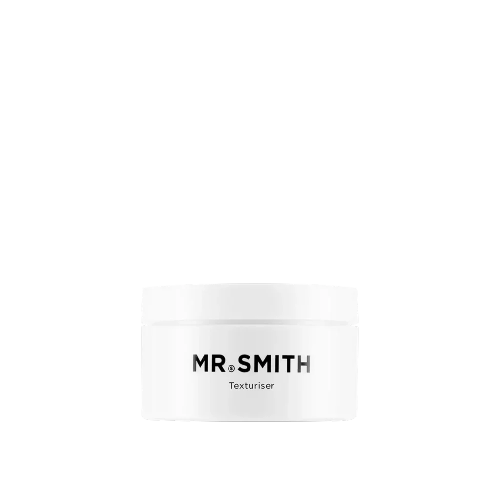 Witte pot Mr. Smith Texturiser haarproduct tegen een zwarte achtergrond.